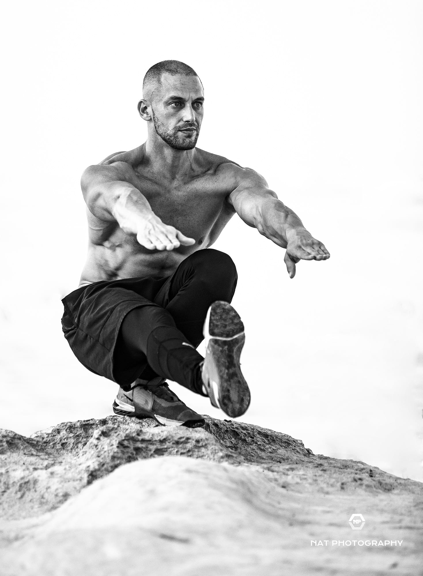 Jonathan Seychell — pistol squat on rock, NEXYRA hybrid training